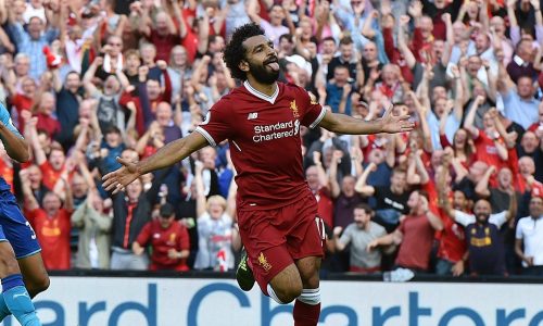 LIVERPOOL, ENGLAND - AUGUST 27: (THE SUN OUT, THE SUN ON SUNDAY OUT) Mohamed Salah of Liverpool celebrates after scoring during the Premier League match between Liverpool and Arsenal at Anfield on August 27, 2017 in Liverpool, England. (Photo by John Powell/Liverpool FC via Getty Images)